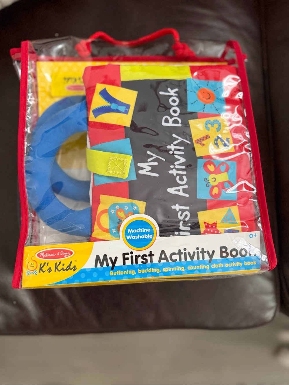 Melissa & Doug Soft My First Activity Book in Red, Blue, Yellow